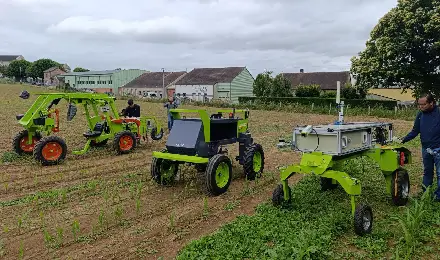 The robots of the GORT project are align in the field ready to start the test.